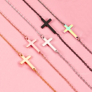 Polished stainless steel cross necklaces in gold, rose gold, silver and black finishes