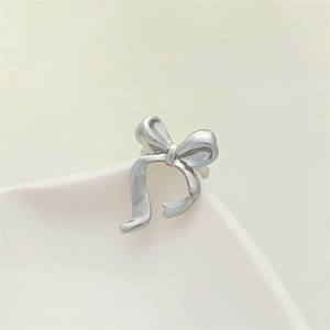 Polished stainless steel adjustable bow ring for women in elegant silver finish