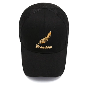 Black mesh baseball cap with gold feather embroidery and Freedom text in a classic design