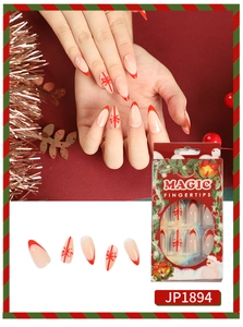 Details der Weihnachts-Kunstnägel mit roten French Tips und Schleifen in Verpackung