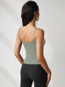 Back view of sage green slim fit camisole with U-neck design and thin straps