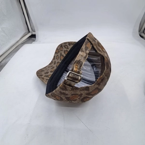 Stylish leopard print baseball cap with metallic gold finish and adjustable silver buckle