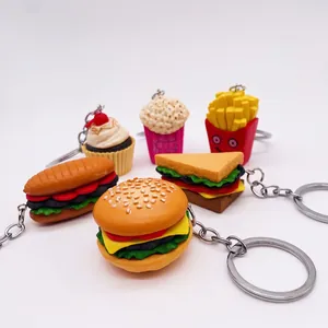 Creative 6-piece fast food keychain set featuring burger, fries, popcorn and hot dog styles