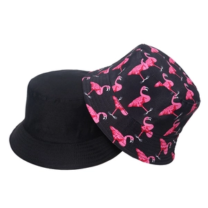 Reversible flamingo print and solid black bucket hat for sun protection and fashion