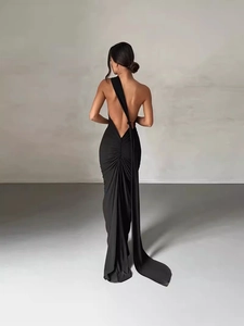 Elegant black backless evening gown with ruched waist and long shoulder ribbons