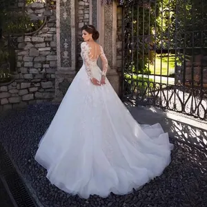 Elegant white lace long sleeve wedding dress with princess ball gown train and button back