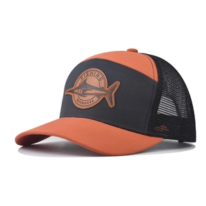 Orange and black trucker hat with leather fishing outdoors patch shown at a 45-degree angle