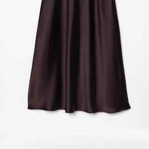 Deep burgundy satin midi dress featuring delicate lace details and glossy silk texture