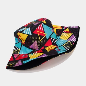 Detail of graffiti patterned bucket hat with red, yellow, and blue geometric graphics
