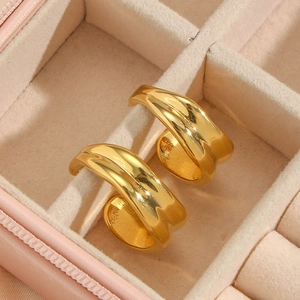 Modern 18K gold plated thick irregular hoop earrings in a pink velvet jewelry box