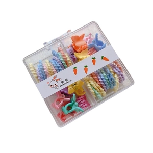 Kids candy colored hair accessory set with spiral bands and mini claw clips in a clear box