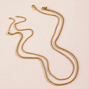 Golden sparkling star chain necklace in minimalist woven stainless steel for women