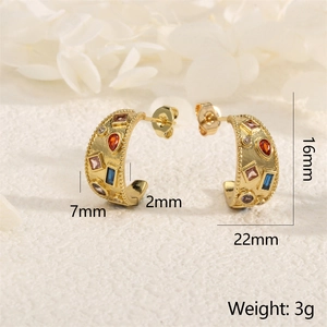Macro shot of gold hoop earring with colorful zircons and size markings in 16x22mm