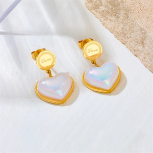 Elegant gold heart earrings with pearlescent white pendants and Love engraving