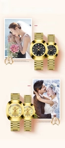 Close-up of gold couple watches with diamond markers in a romantic wedding setting