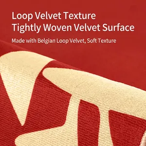 Red Belgian velvet wedding rug with geometric pattern showing soft looped texture