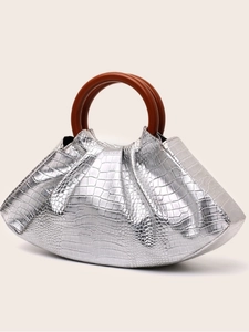 Silver crocodile-embossed dumpling handbag with round brown wooden handles and moon shape