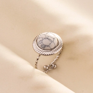 Detailed close-up of 304 stainless steel ring with white marble stone and twisted band
