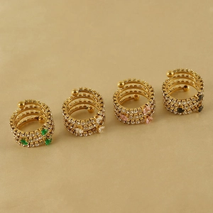 Multi-layer spiral gold ring set with emerald, pink, black, and white cubic zirconia