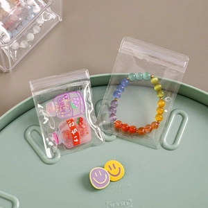 Clear plastic self-sealing jewelry storage bags for dustproof rings and necklaces