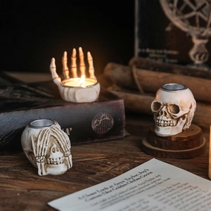 Gothic skull and skeleton hand resin candle holders for Halloween table decoration