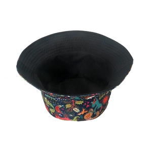 Detail of retro ethnic bucket hat featuring colorful elephant patterns and black inner lining