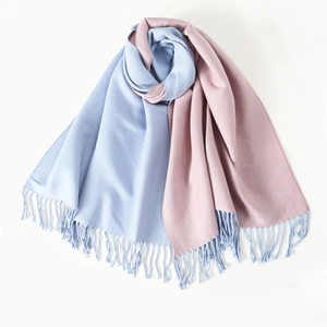 Luxurious pink and blue reversible faux rabbit fur scarf with elegant fringe tassels