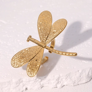 Minimalist gold dragonfly stainless steel open ring shown from a 45-degree angle