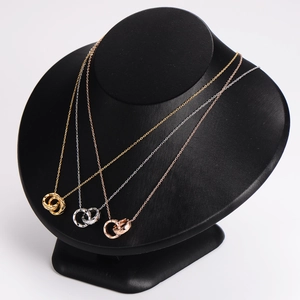Polished interlocking double ring necklace in gold, silver and rose gold finishes