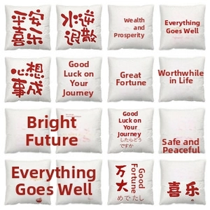 Grid view of 16 white square pillowcases with red festive Chinese character prints