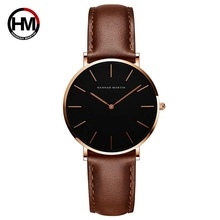 Detailed view of Hannah Martin quartz watch with black dial and brown leather strap