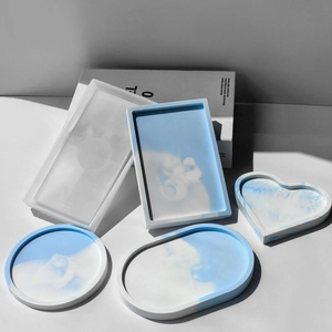 Oval and heart-shaped marble resin coaster silicone molds for DIY resin casting tray crafts