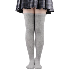 Detailed knit texture of light grey over-knee high socks with three athletic stripes