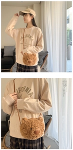 Close-up detail of a cute brown plush bear crossbody bag with a soft faux fur texture