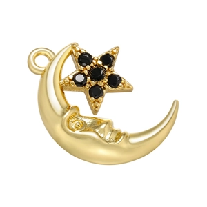 Golden crescent moon pendant with face relief and black zircon star inlay on white background