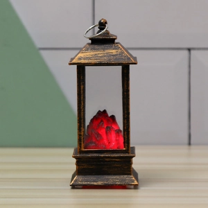 Dettaglio lanterna vintage in bronzo con carbone a LED rosso e anello superiore
