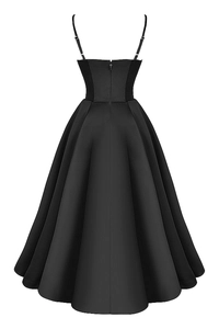 Back view of elegant black French-style double-strap dress with double-layered mesh flowy skirt