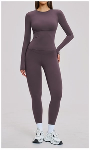 Detailed view of dark purple brushed fabric yoga set with compression fit and tummy control