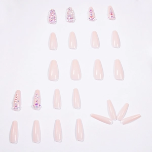 Long ballerina press-on nails in nude pink with rhinestone and pearl embellishments