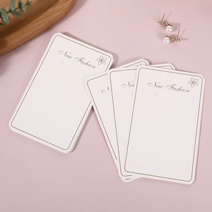 Elegant ivory jewelry display cards with gold foil accents for earrings and packaging