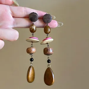 Retro bohemian drop earrings with wood grain texture and multi-colored resin beads