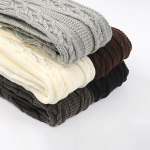 Thick cable knit leg warmers in grey beige brown and black colors for winter warmth