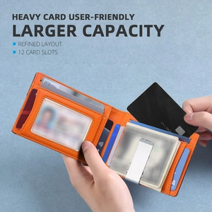 Detail view of orange leather RFID wallet with 12 card slots and a metal money clip