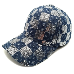 Blue denim baseball cap with silver sequin checkerboard pattern and distressed details