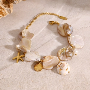 Golden starfish and shell charm bracelet with natural mother of pearl beach jewelry