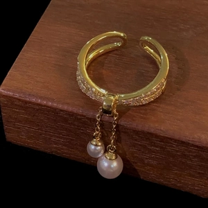 Double-layered gold-plated open ring with shimmering zircon and elegant pearl fringe