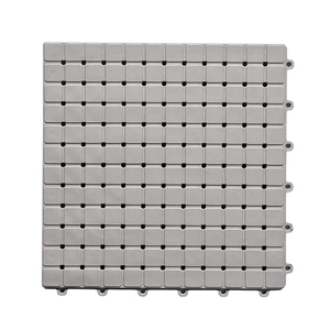 Gray TPE interlocking bathroom floor mat with drainage holes and non-slip surface
