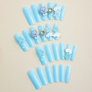 Extra long baby blue press-on nails with 3D stars, clouds and pearl heart charms