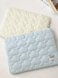 Quilted cloud pattern laptop sleeve in blue and cream white for 11 to 15 inch tablets