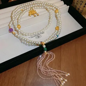 New Chinese multi-layer pearl necklace with gold lotus pendant and pink crystal tassel
